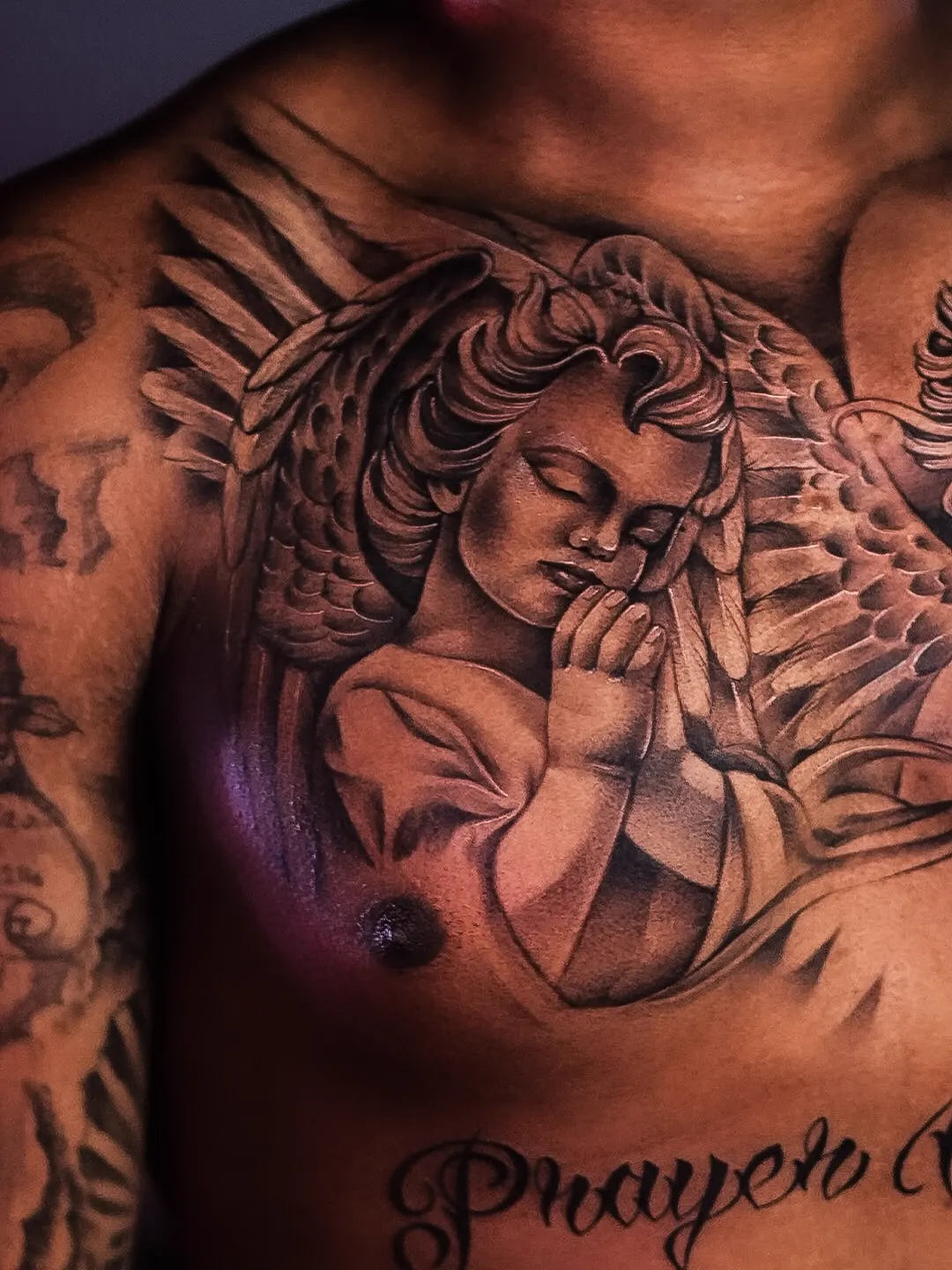 Guardian angels with "Prayer Warrior" script — black & grey realism tattoo on the chest, by Foenix Ink, Hollywood FL (session 2)