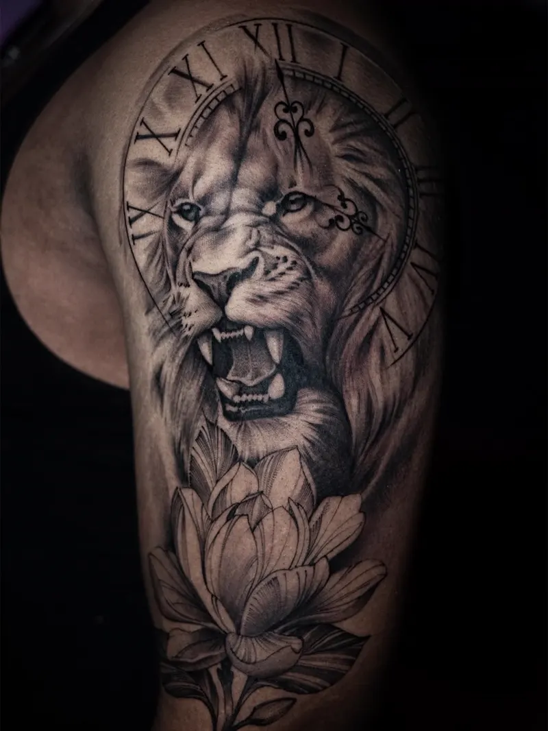Lion with clock and lotus — black & grey realism tattoo on the upper arm, by Foenix Ink, Hollywood FL (1/3)